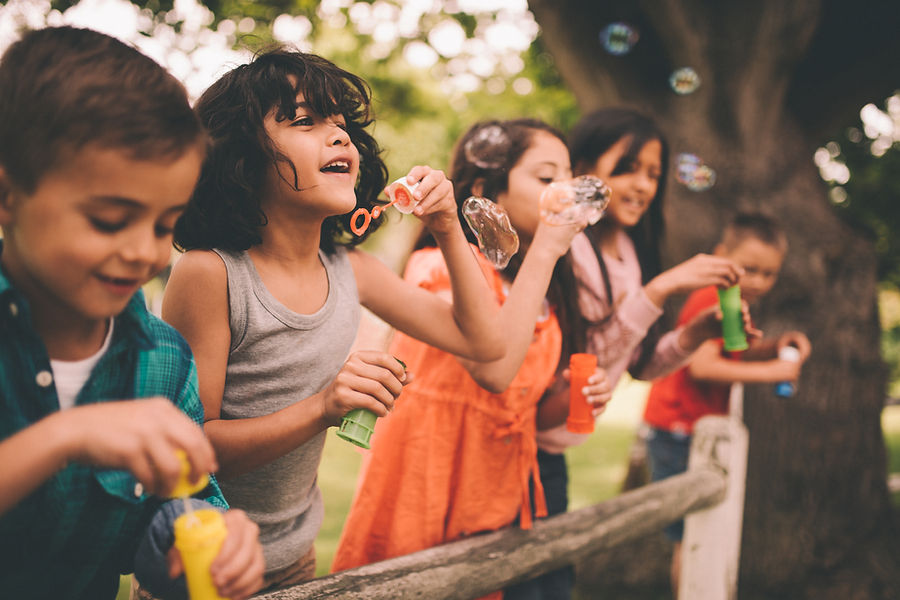 Kids blowing bubbles